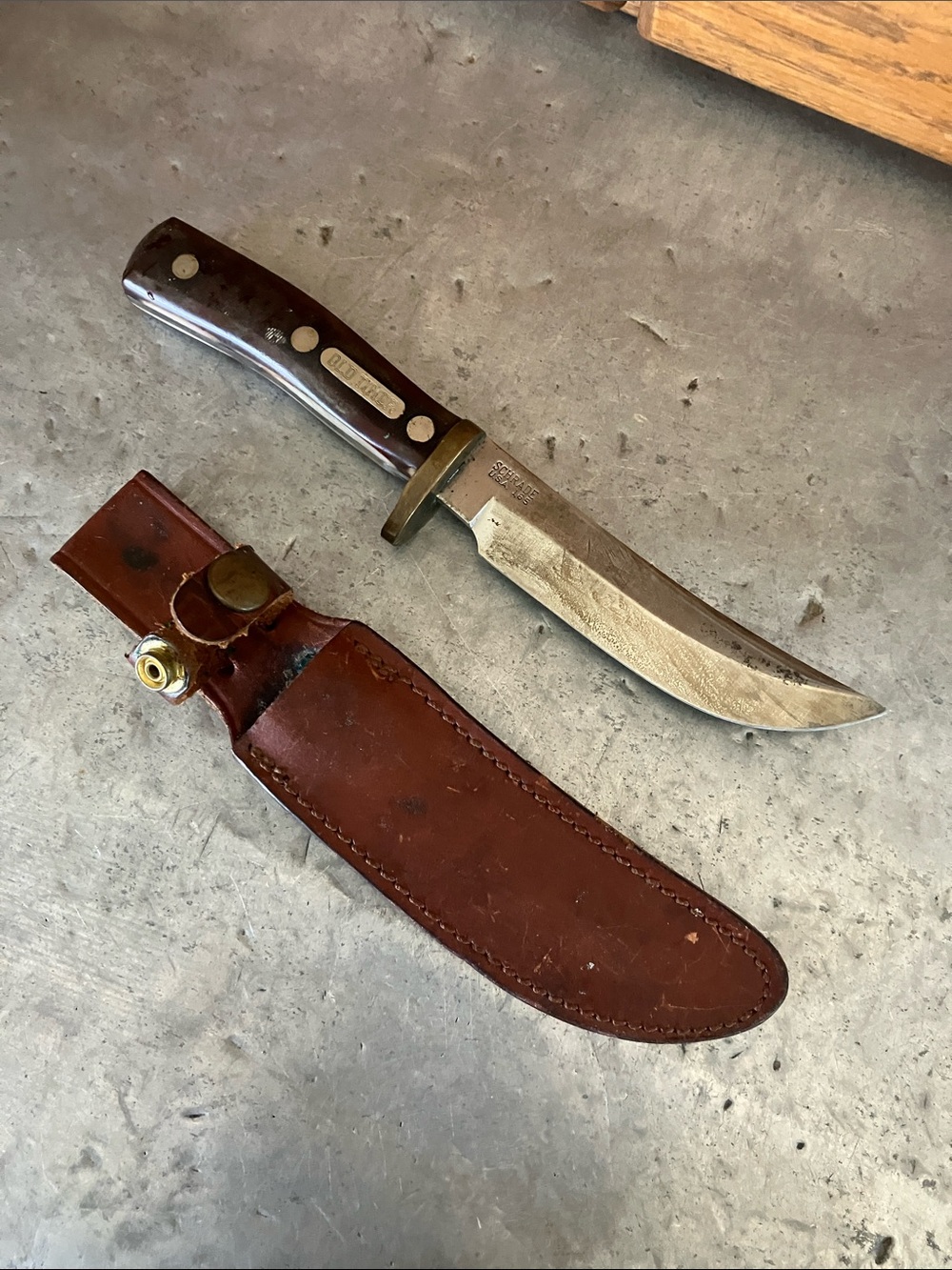 Vintage Fixed Blade Hunting Knife with Brown Handle and Leather Sheath